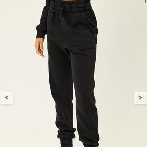 Frankie’s Bikini’s black sweatpants. Never worn and still with price tags.